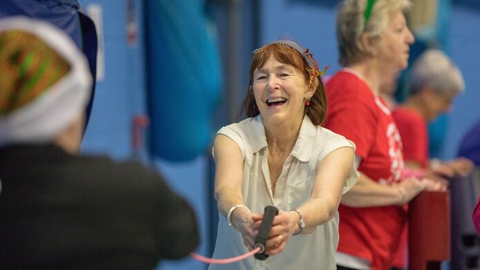 Participant takes part in an Active Living Seniors exercise class.