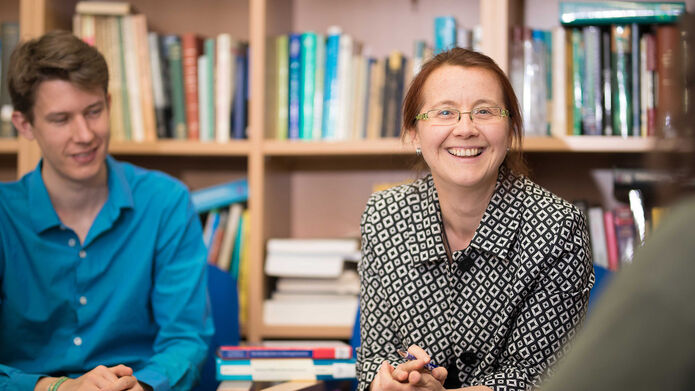 Photo of students working in library