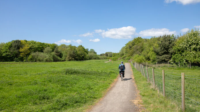 cyclist going through nature reserve