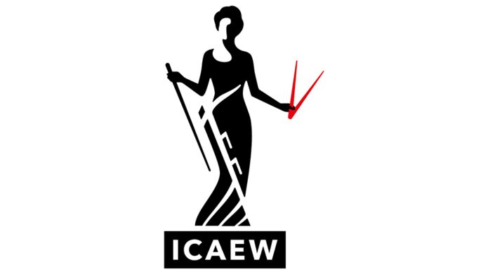 A black figurine stands with a long black stick in her right hand, and set of red smaller sticks in the left.