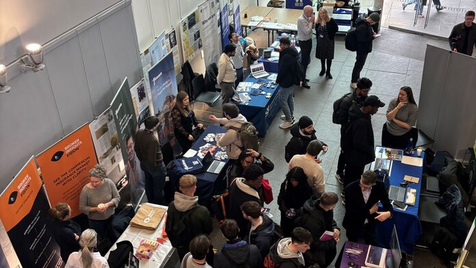 Aerial shot of attendees browsing stalls at the science and engineering careers expo