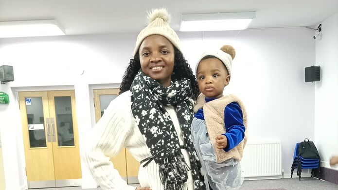 Portrait of Glory Adiele and her daughter