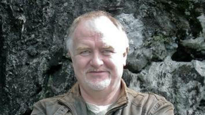 portrait of man in camouflage clothing