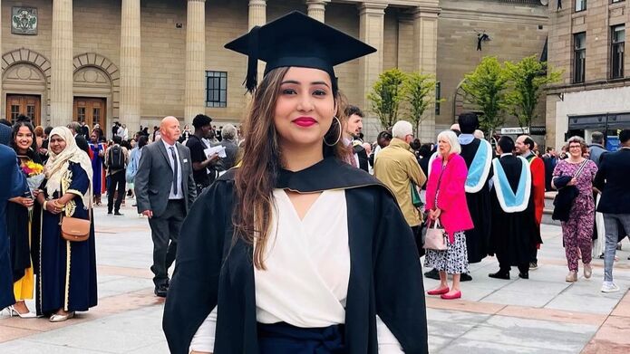 Student in graduation robes