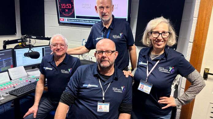 Portrait of Ken Anton (left) and colleagues