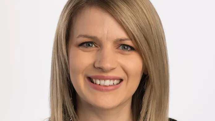 Portrait photo of Jenna Breckenridge