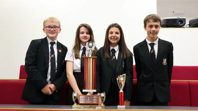 Pupils from Bathgate Academy posing with a trophy