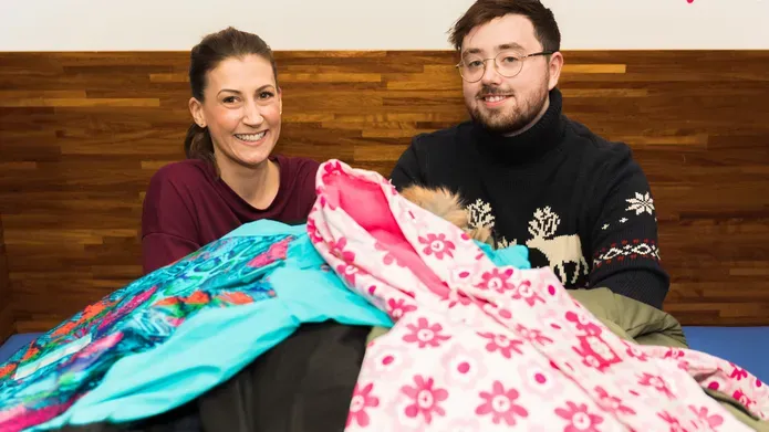 Caroline Branchu and Scott Quinn with coat collection