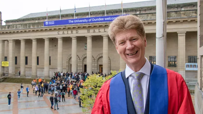 Jim Spence wearing his rector's robes