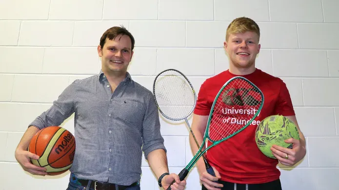 Students holding balls and rackets