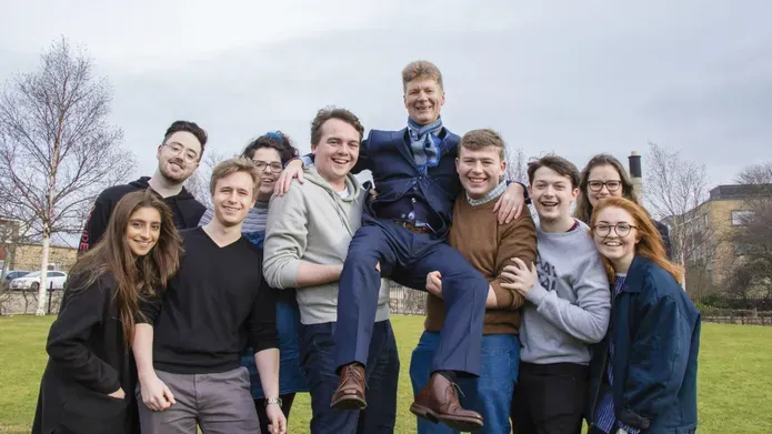 University of Dundee Rector Jim Spence being lifted off the ground by students