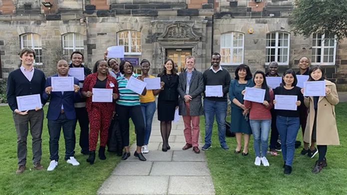 Students being presented with certificates