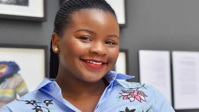 a picture of Stephanie in a blue shirt