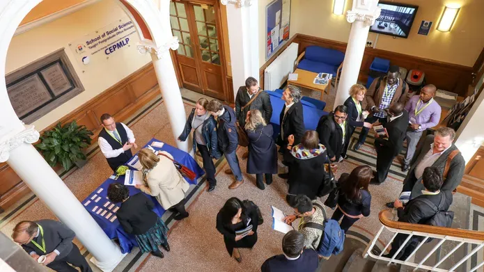 looking down on attendees at the mining conference in the CEPMLP building