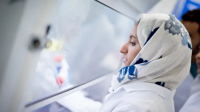 a woman working in a lab