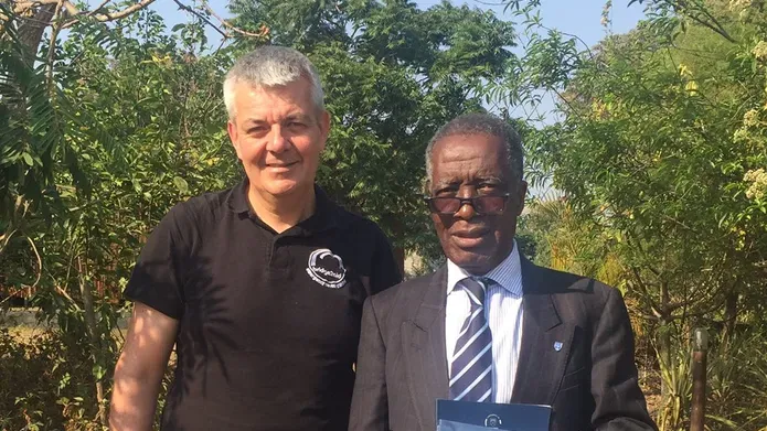 an image of Wiston next to another man