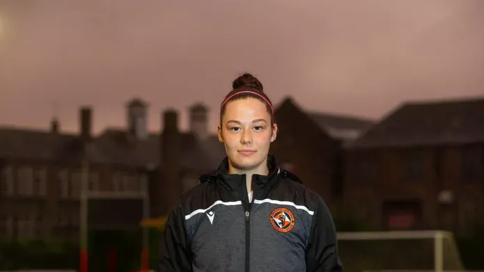 student haley kern posing in Dundee United football kit