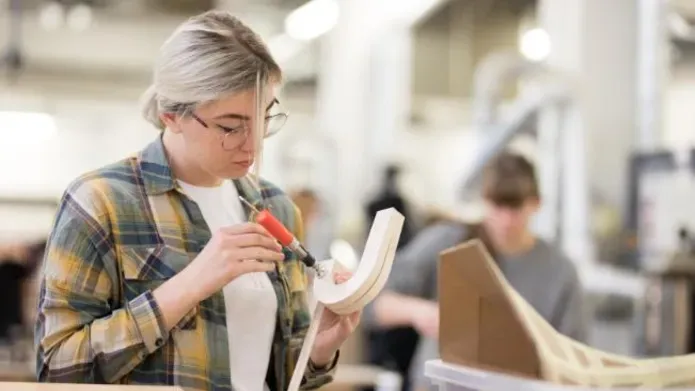a student working on a project in the workshop