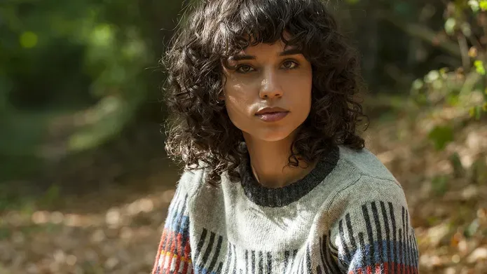 jasmine sitting in the woods