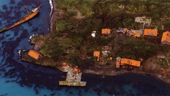 a satellite image of a coastal village 