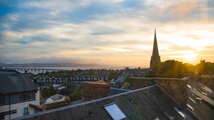 View over campus rooftops to the River Tay