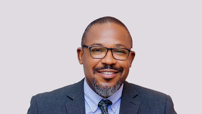 portrait of Major Selasie Atuwo wearing a suit