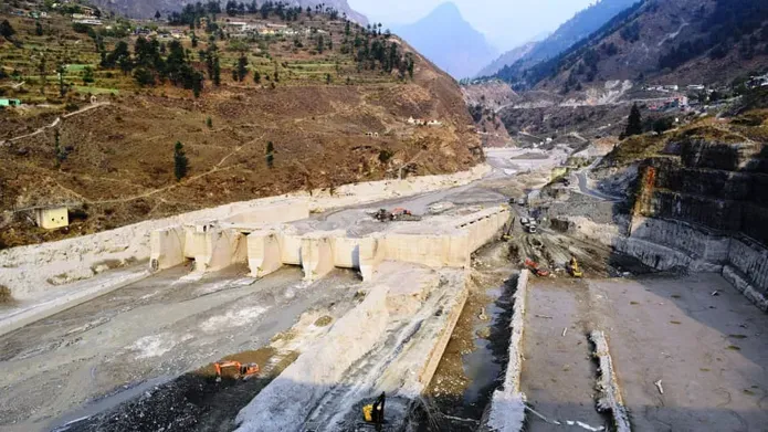 Grey rubble left from landslide - destroyed Tapovan Vishnugad hydroelectric plant
