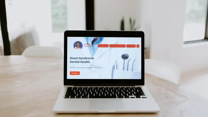 down syndrome dental health site on laptop