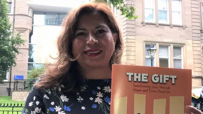 Mayra Crowe with The Gift comic