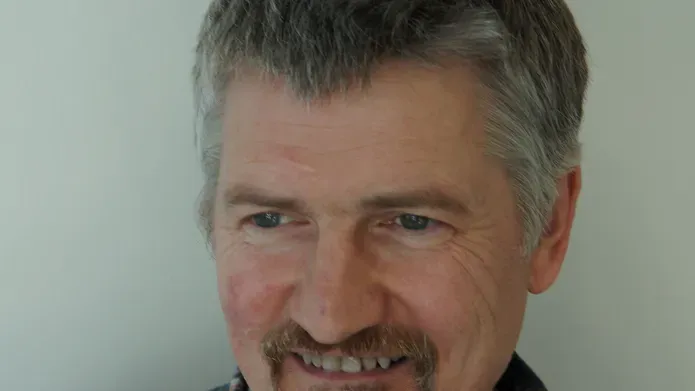 Portrait photo of Angus Lamond