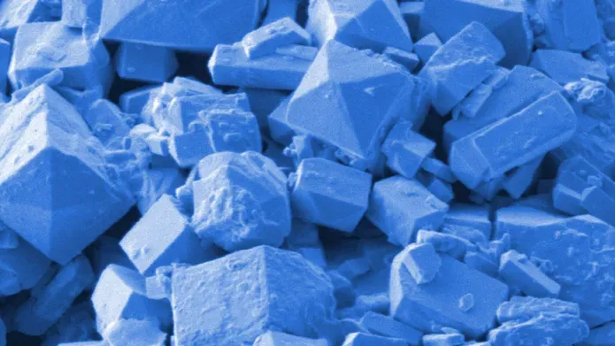 a pile of blue cubes and diamonds