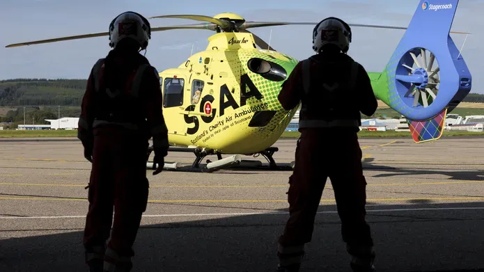 SCAA helicopter and crew