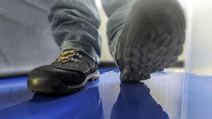 Sole of shoes leaving footprints