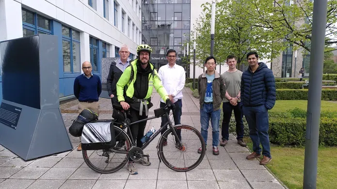 Dr Mathieu Soetens with colleagues outside the University of Dundee's School of Life Sciences building.jpg
