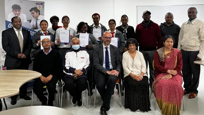 group sat togfether posing