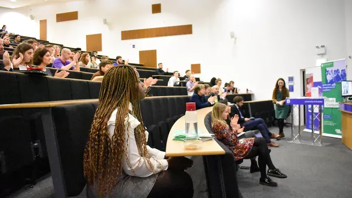 Front row of an audience sitting in a lecture theatre at the Venture 2020 competition
