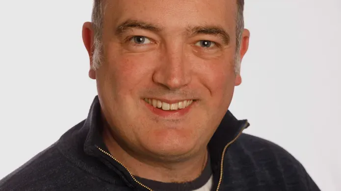 Portrait photo of Nick Brewer