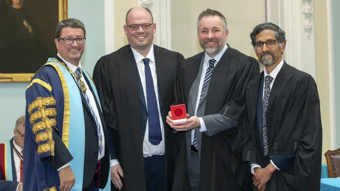 dundee team receiving the Dundas award