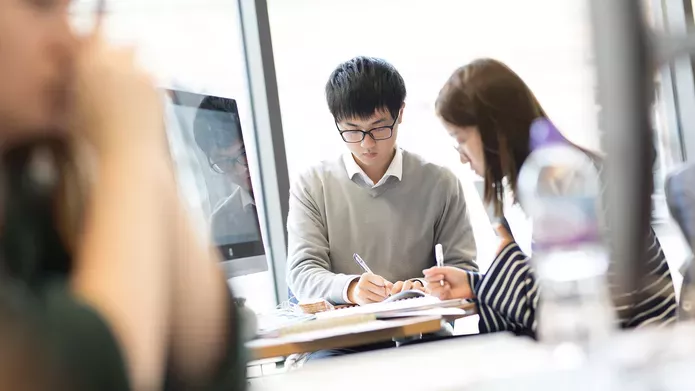 Student studying in library