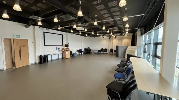 Dalhousie 1S01 - chairs and tables along the window showing an empty floor space