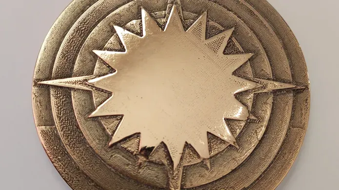 Copper medal designed by Lucy Smith