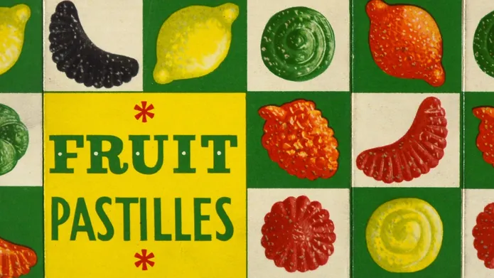 Design from a 1950s packet of Fruit Pastilles, showing sweets on a coloured checkboard.