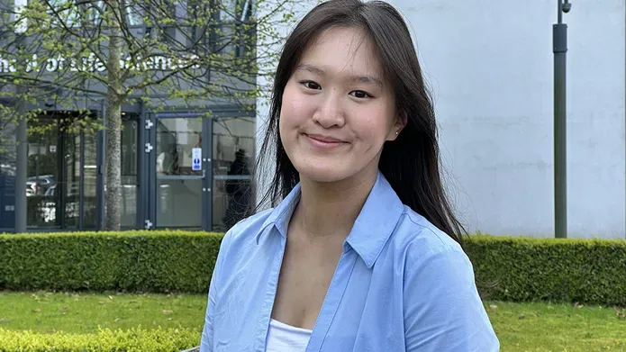 Jennie Yang standing outside the Life Sciences building.