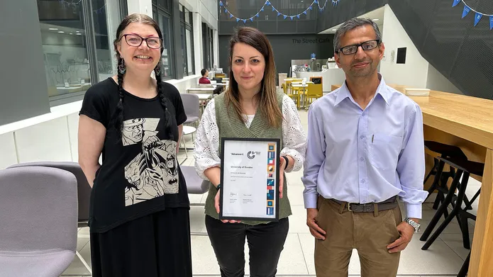 Lesley-Anne Pearson, Melissa D’Ascenzio and Gopal Sapkota with the 2023 Athena Swan award