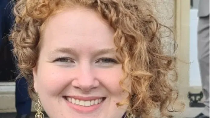 Tara wearing a royal blue outfit