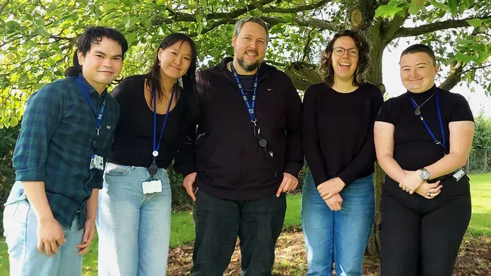Dr Martin Balcerowicz (centre) and his team