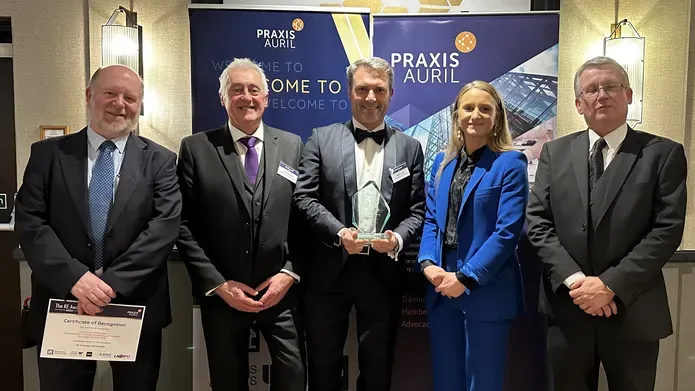 Members of CeTPD and RIS stand with their award