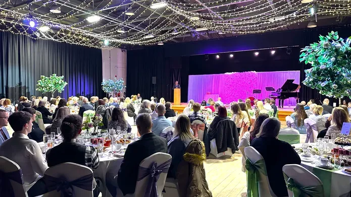 Professor Iain Gillespie on stage addressing guests at the Dundee Difference Awards