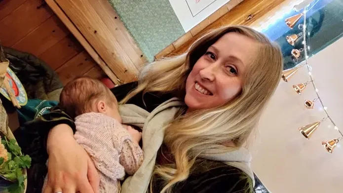 Beth Strachan breastfeeding her daughter