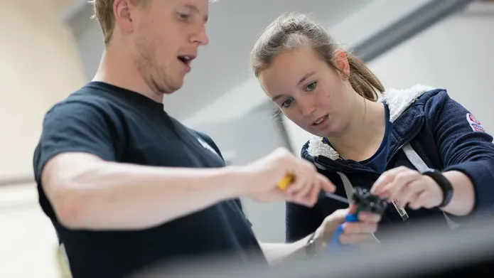 Mechanical Engineering students in a lab